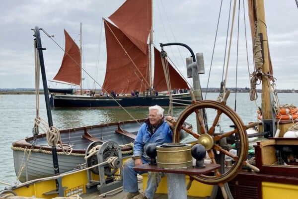 Richard Titchener at the wheel of SV Blue Mermaid