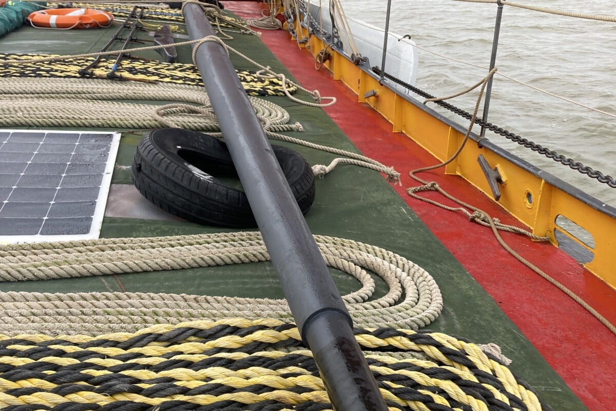 Photo of Cutty Sark's new spar on the deck of Blue Mermaid